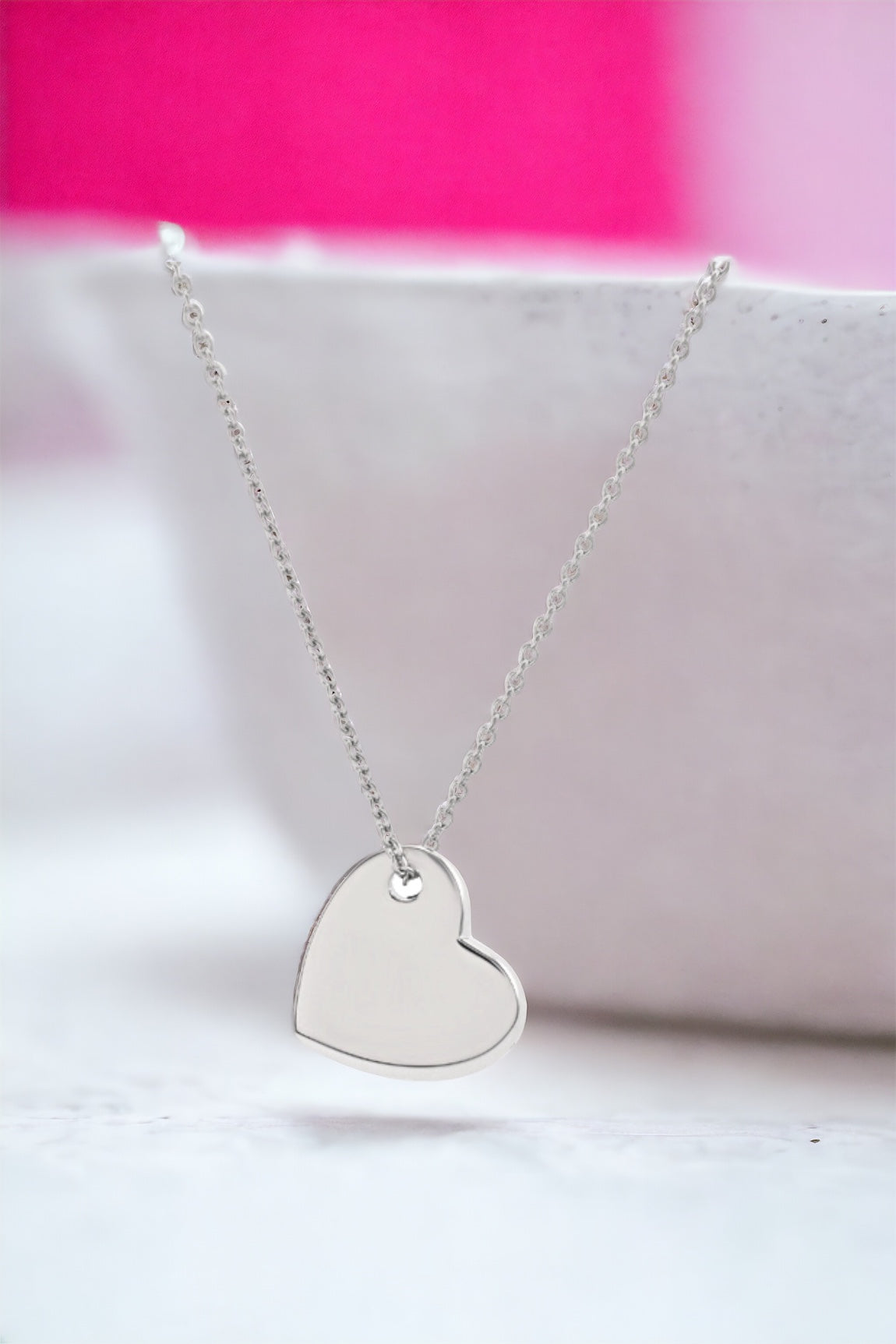 Small Faceted Heart Necklace in Silver