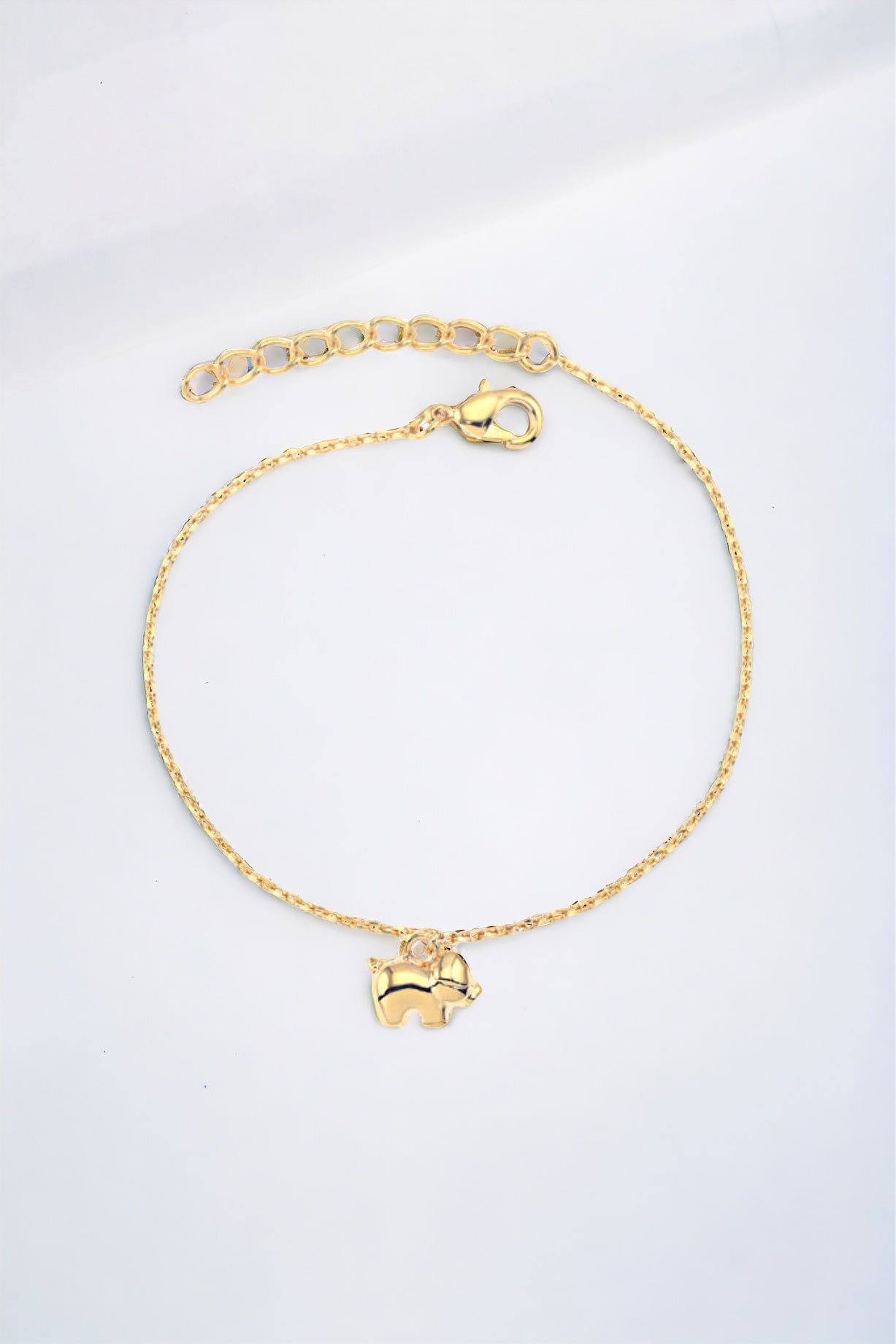 Bracelet en or avec petit cochon taille adulte