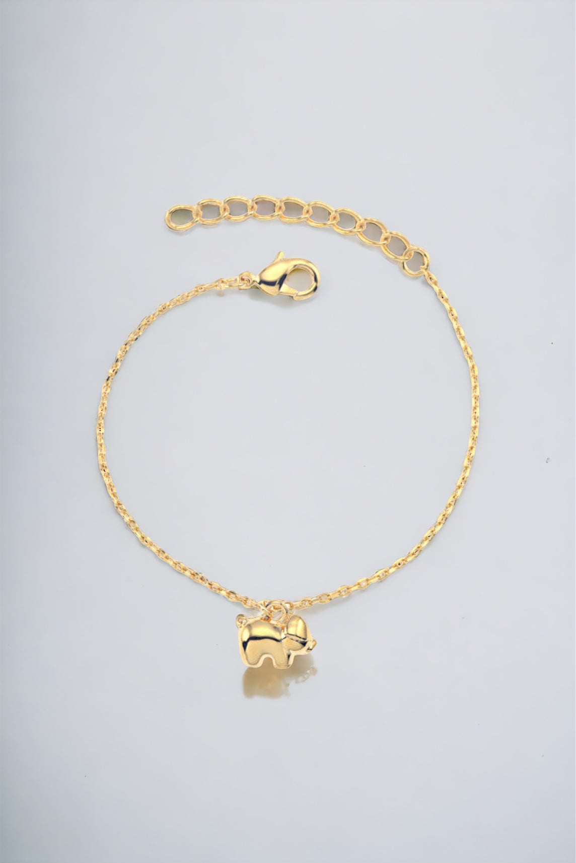 Bracelet en or avec petit cochon taille enfant