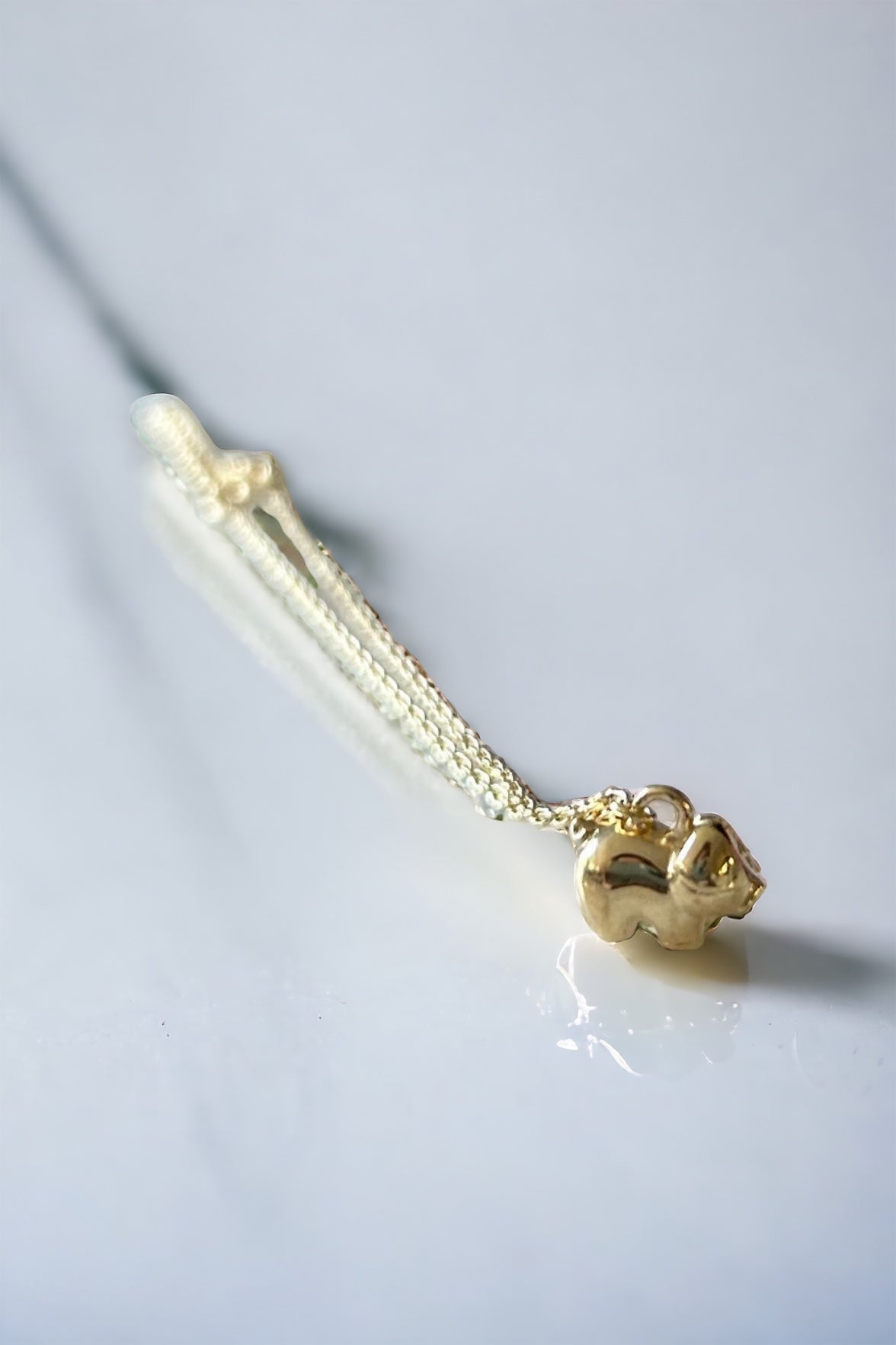 Bracelet en or avec petit cochon taille enfant